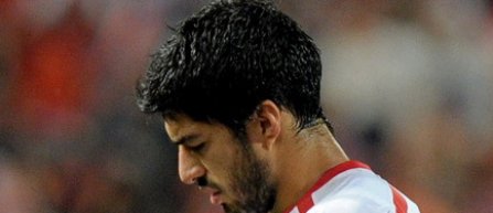 Luis Suarez: Raman la Liverpool