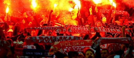Federatiile din Anglia si Polonia, sanctionate dupa incidentele produse de fani
